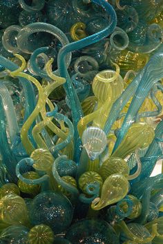 an artistic glass sculpture made to look like flowers