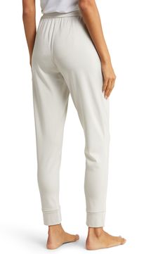 These ultrasoft and breathable joggers with an elastic/drawstring waist are the perfect go-to when you want to cozy up on the couch. 70% viscose, 26% acrylic, 4% spandex Machine wash, tumble dry Imported Sporty Comfort Stretch Bottoms For Lounging, Relaxed Fit Pull-on Sweatpants For Lounging, Relaxed Fit Joggers With Elastic Waistband, Athleisure Comfort Stretch Sweatpants With Elastic Cuffs, Athleisure Sweatpants With Comfort Stretch And Elastic Cuffs, Loosely Fitted Joggers For Loungewear, Comfort Stretch Athleisure Sweatpants With Elastic Cuffs, Sporty Comfort Stretch Pants For Loungewear, Athleisure Pants With Elastic Waistband For Loungewear