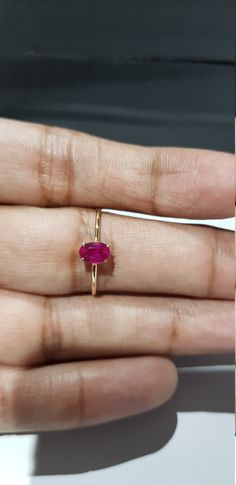 14k solid yellow gold 6x4 mm natural ruby precious gemstone ring. 1. The weight of the natural ruby precious gemstone used in the ring =0.56 cts. 2. The weight of the 14k solid yellow gold used in the ring=0.840 gms. The ruby is the birthstone for the people born in the month of July. This is absolutely gorgeous ring. I am pretty confident that my work will be appreciated. Thanks. Dainty Oval Ruby Birthstone Ring, Dainty Oval Ruby Ring For Formal Occasions, Oval Ruby Ring For Formal Occasions, Oval Yellow Gold Ruby Ring With Birthstone, Oval Solitaire Ruby Ring, Fine Jewelry Oval Solitaire Ruby Ring, Oval Yellow Gold Ruby Ring, Oval Ruby Ring In 14k Gold As Gift, Dainty Oval Ruby Ring In Gold