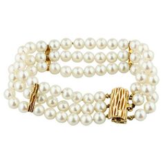 Gorgeous Pearl Bracelet  Features Three Rows of Round Pearls Pearls Appx 5 - 6 mm in Diameter Nice Whitish, Pinkish, Mauvey Pearlescence 78 Pearls Total Three 14k Yellow Gold Bar-Shaped Accents 14k Yellow Gold Clasp Total Length = 7" Total Mass = 33.10 grams Beautiful Gift! Three Strand Pearl Bracelet, Van Nuys, Shell Bracelet, Pearl Shell, Gold Bar, Pearl Bracelet, Gold Accents, Jewelry Bracelets, Beaded Bracelets