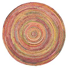 a round rug with multicolored circles on the bottom and sides in various colors