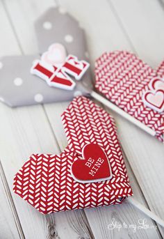 three valentine's day treat boxes with hearts on them