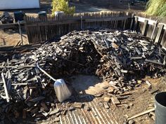 a pile of rubble sitting in the middle of a yard