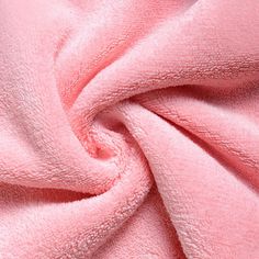 a close up view of a pink fabric