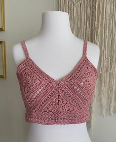 This is a XSmall size hand made crochet crop top. It's a dusty rose color. It's made with 100% cotton yarn. It doesn't have an adjustable back or neck tie, so it is only for small sized, A or B bra sized ladies. Bust 30". It is unlined. Washing Instructions:  Hand Wash with Cold Water, line dry. No dryer I accept but do not like returns as it is a hand made product and I spend hours on this beautiful item. So please check the pictures carefully, and ask me if you are doubtful with the measurements. Pink Bohemian Crochet Cotton Top, Pink Cotton Crochet Top With Crochet Trim, Pink Crochet Trim Cotton Top, Pink Fitted Bohemian Crop Top, Fitted Pink Bohemian Crop Top, Pink Crochet Crop Top For Festival, Pink Crochet Lace Top For Festival, Pink Fitted Crochet Crop Top, Fitted Pink Crochet Lace Crop Top