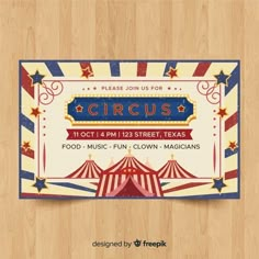 a circus ticket is shown on a wooden surface with stars and stripes around the edges