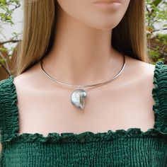 This beautiful choker necklace are made of pearlized blue nautilus shell and 925 hypoallergenic sterling silver choker. Gorgeous and unique! Great idea for gift! 🎁 Necklaces - Length : approximately 16" long, 3mm thick solid wire choker. - Sterling choker weight : approximately 29.5g. - This is made of natural organic real seashells, blemishes or imperfections are part of its characteristics. - Each natural seashell has its own uniqueness, however, you will receive the same quality seashell as Elegant Blue Shell Necklace As A Gift, Elegant Blue Shell Necklace For Gift, Elegant Sterling Silver Shell Jewelry, Silver Shell-shaped Necklace With Pearl Pendant, Elegant Handmade Silver Shell Necklace, Unique Silver Shell-shaped Necklace, Silver Elegant Shell-shaped Necklace, Elegant Silver Shell Necklace, Unique Shell-shaped Silver Necklace