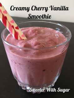 a pink smoothie in a glass with a straw sticking out of it's top