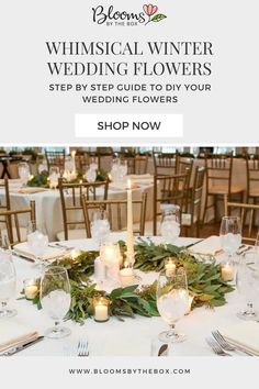 a table with candles and flowers on it for a winter wedding flower shop advert