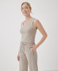 What's cooler than being cool? The Cool-Stretch collection. Made with breathable organic cotton and just enough flex for layering, lazing, and living in Soft, breathable organic cotton Scoop neck, sleeveless Straight hem with small side vents Cropped length for easy tucking and styling Made with organic cotton in a Fair Trade certified factory Cotton Activewear For Summer Loungewear, Cotton Activewear For Spring Loungewear, Spring Cotton Activewear For Loungewear, Summer Cotton Activewear For Loungewear, Summer Cotton Loungewear Activewear, Solid Cotton Activewear For Loungewear, Comfortable Versatile Loungewear Tops, Comfortable Cotton Everyday Tops, Comfortable Cotton Summer Activewear