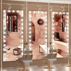 an image of a beauty salon setting with lights on the walls and chairs in front