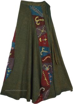 Dusky Olive Green Boho Skirt with Embroidered Patches - A boho long wrap skirt in an Earth color - a different dark olive green - in a pure jersey cotton fabric.  Differently shaped small patches in dusty mauve, red and blue colors are appliqued in a flowy half spiral shape going from waist to the hemline of the skirt. #tlb #WrapAroundSkirt #Patchwork #Stonewash #Embroidered #Applique #Misses #Maxi Skirt #vacationclothing #Handmade #Fall Green Boho Skirt, Dnd Tiefling, Long Green Skirt, Tiefling Bard, Long Wrap Skirt, Dusty Mauve, Hippie Look, Boho Skirt, Spiral Shape