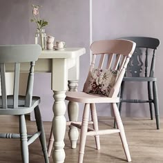 two chairs sitting next to each other in front of a wall with the words summer furniture sale within