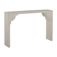 a white marble fireplace mantel with an arch