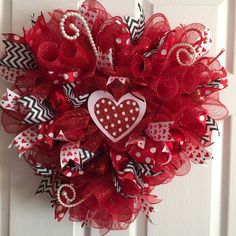 a valentine's day wreath on a door