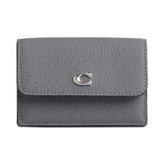 With multiple card slots to keep you organized, this Trifold Leather Wallet by COACH is a triple threat..4-1/4'W x 2-3/4'H x 1'D); 0.2 lbs. approx. weight.Snap closure.Hardware tone varies by color.6 interior cars slots & full-length bill compartment.Leather.Spot clean.Imported Classic Coach Trifold Wallet With Card Slots, Elegant Compact Coach Trifold Wallet, Coach Bifold Card Holder With Interior Slots, Coach Wallets With Card Slots For Daily Use, Coach Wallets With Card Slots, Coach Wallets For Daily Use, Compact Coach Trifold Wallet With Card Slots, Coach Rectangular Trifold Wallet With Coin Pocket, Coach Trifold Wallet With Card Slots