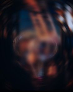 a blurry photo of a camera lens