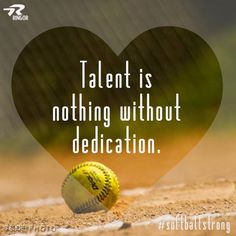 a softball ball sitting on top of a baseball field with the words talent is nothing without dedication