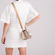 Mlouye Naomi, a shoulder bag made of twisted polygons that create functional interior space alongside architectural aesthetic. Architectural Aesthetic, Functional Interior, Secret Sale, New Launch, Interior Spaces, Cow Leather, Bag Making, Product Launch, Mini Dress