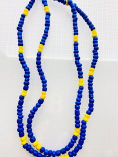 This is an Ochosi Orisha necklace. Has been designed, 100% handmade. With beautiful beads and accessories. Can be used with an everyday outfit, while wearing your Orishas Necklace. Please handle with care! Must be used delicately and to not use near harmful chemicals or liquids. Made from strong material Comes in one size only! Any questions or comments send me a message. No refund or exchange. Visit my store each week for new items, also visit my other stores on Etsy at MandSMagicJewelryBox for Beach Beaded Necklace With Large Oval Beads, Heishi Beads Wooden Necklaces, Hand-strung Round Beads Beach Necklace, Beach Necklaces With Hand-strung Round Beads, Beach Hand-strung Necklace With Round Beads, Beach Necklaces With Round Hand-strung Beads, Large Oval Bead Necklace For Beach, Beach Jewelry With Oval Wooden Beads, Beach Necklace With Large Oval Beads