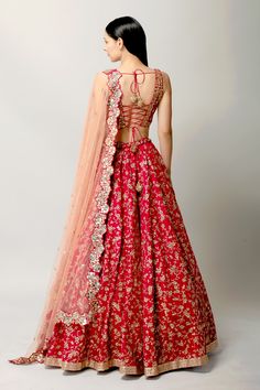 Rani pink raw silk lehenga with attached cancan and jaal pattern embroidery in tilla, zardozi and sequins work. Paired with an embellished padded blouse and soft pink cut work border dupatta.
Component: 3
Pattern: Embroidery
Type Of Work: Tilla, Zardozi and Sequins
Neckline: V Neck
Sleeve Type: Sleeveless
Fabric: Lehenga and Blouse: Raw Silk, Dupatta: Net/Tulle
Color: Pink
Other Details: 
Attached lining
Tilla, sequins and zardozi work
Occasion: Bride,Wedding - Aza Fashions Raw Silk Embroidery, Lehenga And Blouse, Raw Silk Lehenga, Gaun Fashion, Pink Lehenga, Embroidered Lehenga, Bridal Lehenga Choli, Silk Lehenga, Net Dupatta