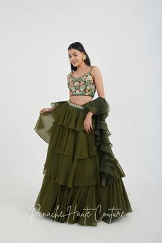 Mehendi Color Tiered Skirt with Crop Top – Panache Haute Couture Green Sharara With Ruffles And Traditional Drape, Green Ruffled Sharara With Traditional Drape, Elegant Green Sharara With Ruffles, Elegant Green Ruffled Sharara, Georgette Sharara With Tiered Skirt For Receptions, Georgette Tiered Skirt Sharara For Reception, Wedding Georgette Skirt With Traditional Drape, Green Georgette Set With Ruffles, Elegant Georgette Skirt With Traditional Drape