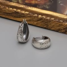 READY TO SHIP Size:  L : 0,79" | W : 0,87" Click for to see collection https://www.etsy.com/shop/RossoJewelry?ref=seller-platform-mcnav ►925K Sterling Silver, they are tarnish free and waterproof, safe for sensitive skin. Perfect for everyday wear. ► In order for the products to be used longer without losing their properties,should be avoided contact with perfume, water and liquid chemicals. ► Each purchase will arrive packaged ready to give as a gift, in a protective box. ► You can leave a special message that you want written in the box during checkout. ► Material Content: 925K Sterling Silver Classic Engraved Silver Earrings, Elegant Engraved Metal Earrings, Silver Engraved Round Earrings, Antique Silver Engraved Earrings For Gift, Antique Silver Engraved Earrings Gift, Elegant Engraved Silver Earrings, Silver Engraved Hoop Earrings For Gift, Vintage Silver Teardrop Clip-on Earrings, Silver Engraved Hoop Earrings For Anniversary