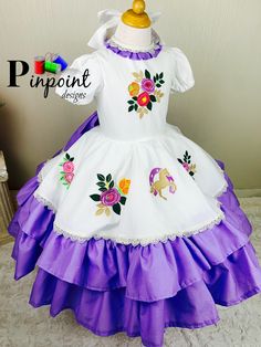 This beautiful dress resembles the escaramuza girls from Mexico. It is also calle charro dress. Is it beautiful, the detail on it is a work of art. All the embroidery is specially designed. I choose this colors because that how the customer wanted, but keep in mind it is made by order. That meant I can customize it however you want. Any color you choose I'll be happy to make it perfect for you. The dress is one piece but I also include a tulle underskirt to make it full but confortable I case th Toddler Ruffle Pants, Mexican Theme Dresses, Escaramuza Dresses, Charro Dress, Girl Mexican, Paw Patrol Birthday Shirt, Embroidered Hair Bows, Tulle Underskirt, Custom Barbie