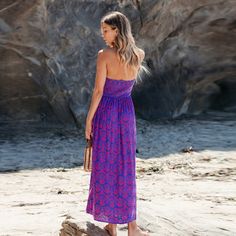 Embrace free-spirited style with our Smocked Bodice Maxi Tube Dress. This enchanting piece features a smocked bodice that hugs your curves comfortably, extending into a flowing maxi-length skirt. Whether you're attending a glamorous event or simply enjoying a casual day out, this dress will keep you feeling confident, stylish, and perfectly in tune with the vibrant energy of the season. Product code: CAA05A4E131WD Purple Ruched Maxi Dress, Purple Fitted Dress With Smocked Bodice, Fitted Purple Dress With Smocked Bodice, Fitted Purple Dresses With Smocked Bodice, Pink Smocked Maxi Dress For Beach, Pink Maxi Smocked Dress For Beach, Pink Maxi Length Smocked Dress For Beach, Blue Bohemian Smocked Dress For The Beach, Blue Bohemian Smocked Beach Dress