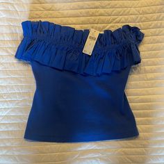 Anthropologie Strapless Ruffle Top. Blue Off-shoulder Tube Top For Summer, Blue Tube Top For Spring Day Out, Blue Off-shoulder Tube Top For Spring, Blue Tube Top For Day Out In Spring, Chic Blue Ruffled Tube Top, Blue Strapless Tops For Summer, Spring Blue Tube Top, Chic Blue Tube Top For Spring, Blue Strapless Top For Vacation