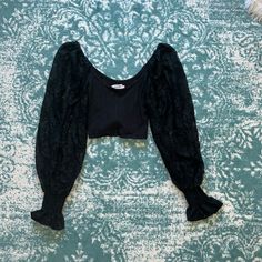 Size S Cropped Long Sleeve From Urban Outfitters. Sleeves Are Lace. Took Off Tags But Never Worn! Elegant Black Crop Top With Lace Trim, Elegant Black Lace Trim Crop Top, Black Lace Trim Crop Top For Party, Black Lace Crop Top For Evening, Chic Cropped Blouse From Urban Outfitters, Fitted Urban Outfitters Blouse For Fall, Summer Black Crop Top With Lace Trim, Black Puff Sleeve Crop Top For Spring, Black Stretch Lace Crop Top