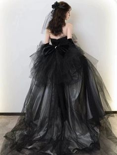 Embody elegance and grace in our Gothic Strapless Black Velvet And Tulle Evening Dress. This stunning wedding dress features a Gothic Velvet Ball Gown design, perfect for those who love alluring and dramatic fashion. Luxurious velvet and tulle fabric create a timeless and sophisticated look, making you the center of attention. Available in plus sizes for all body types. Emo Ball Gown, Black Sweetheart Neckline Ball Gown For Wedding, Black Evening Dress For Debutante Ball, Black Ball Gown Wedding Dress For Debutante Ball, Black Ball Gown For Debutante Ball, Black Wedding Gown With Sweetheart Neckline, Black Tulle Evening Wedding Dress, Elegant Black Organza Gown, Black Ball Gown For Wedding