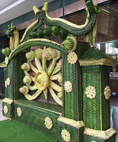 an elaborately designed bed in the shape of a house