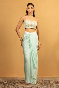 Ice blue blouse with gota work embroidery. Paired with draped dhoti skirt and cape. - Aza Fashions Traditional Fitted Draped Sets, Summer Cutdana Choli With Traditional Drape, Traditional Pre-draped Saree For Summer Reception, Traditional Fitted Set With Side Open Design, Traditional Fitted Sets With Side Open, Fitted Saree With Tilla Detailing, Fitted Summer Traditional Wear With Traditional Drape, Fitted Blouse Piece With Tilla For Diwali, Fitted Tilla Saree For Reception