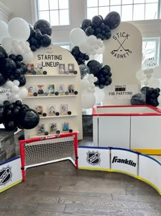 balloons and hockey goalies are on display in the store