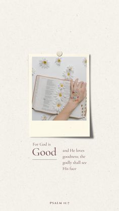 an open bible with daisies on it and the words, for god is good