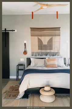 Cozy bedroom with a modern bed, woven tapestry, and decorative pillows. Cute Accent Wall Ideas, Bedroom Green Accent Wall, Dark Accent Wall Bedroom, Accent Wall Bedroom Ideas, Enchanting Bedroom