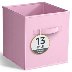 a pink storage cube with the 13 inch badge on it