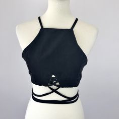 Black Suede Strappy Zip Up Racerback Crop Top Tank Condition: New Without Tags. No Rips Or Stains. Has No Brand Or Care Tags. Sizes: Small And Medium Made In China Approximate Measurements (Flat Lay): Size Small: Length: 9.5 In. Bust: 15.5 In. Size Medium: Length: 10 In. Bust: 17 In. Features: Zip Back Closure Halter Neckline Racerback Silhouette Suede Fabric Lined Convertible Straps On Hem For A Unique Style S: A217, 218, 219, 220, 221 M: A222, 223, 224 Black Top With Built-in Bra For Day Out, Black Halter Top With Built-in Bra For Spring, Black Halter Neck Crop Top With Built-in Bra, Black Tops With Built-in Bra And Strappy Back, Black Tank Top With Built-in Bra And Strappy Back, Black Top With Built-in Bra And Strappy Back, Casual Crop Top With Built-in Bra And Strappy Back, Chic Black Strappy Back Halter Top, Chic Black Halter Top With Strappy Back