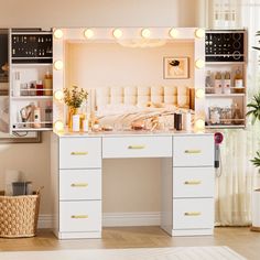 a white vanity with lights on it in a room