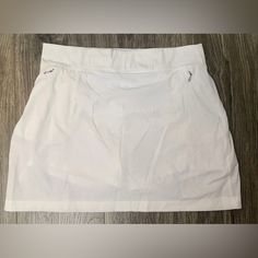 Calvin Klein Performance Skort Womens Sm Nwot Zip Pockets 28" Waist 15" Overall Length Sizes Are Approximate, Measured Laying Flat With Clothing Tape Calvin Klein Fitted Casual Shorts, Calvin Klein Fitted Shorts, Casual Fitted Calvin Klein Skirt, Fitted Calvin Klein Casual Skirt, Calvin Klein Fitted Casual Skirt, Clothing Tape, White Skort, Calvin Klein White, Womens Calvin Klein