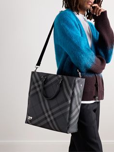 Burberry's tote bag is perfectly sized to fit the essentials for long work commutes or overnight trips.Topped with sturdy handles, it's jacquard-woven with the house's signature checks and features an internal zipped pocket to keep smaller items organised. There's enough space for a change of clothes plus a laptop and water bottle. Use the optional shoulder strap to wear it cross-body. Tote Bag For Men, Burberry Tote Bag, Burberry Tote, Luxury Sneakers, Best Bags, Classic Sneakers, Espadrille Shoes, Clothes Collection, Black Tote Bag