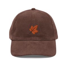 The perfect hat for someone that loves Fall & Autumn (or as a gift for yourself!). Handmade & stitched in the USA. As part of our commitment to sustainability, each cap is made-to-order. Our cap features a fall leaf embroidered onto it, handmade from scratch. No mass-produced patches! It pairs perfectly with our vintage corduroy dad cap that is oozing with retro style & charm. It is a classic, high-quality piece that will last you for years & years to come. Plus it is soft & comfy to wear! It fits all head sizes and is unisex, featuring an adjustable golden buckle. Whether you purchase our caps as a gift for him, or a gift for her, they will love wearing this cap. * Sustainably made-to-order. * Made from 100% cotton corduroy to make it extra soft. * Cotton twill sweatband & taping. * Adjus Adjustable Flat Bill Baseball Cap For Fall, Everyday Fall Baseball Cap With Curved Brim, Fall Cotton Hat With Curved Brim, Cotton Hat With Curved Brim For Fall, Cotton Cap For Fall, Curved Brim Cotton Hat For Fall, Everyday Fall Baseball Cap, Brown Dad Hat, One Size, Everyday, Brown Dad Hat For Everyday Use