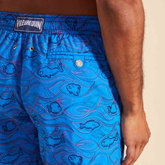 Embroidered men swim shorts, limited production, 99 pieces for the colors Storm blue, Neon blue, Navy blue and Palace blue, 199 pieces for the color red.Swimwear with elastic waistband with drawstring and silver tips (engraving 925 certified)Side pockets and back pocket with Turtle personnalized round snap buttonMen swim shorts with two back eyeletsSide leg length in M: 39.5 cm Enjoy a complimentary first repair of your swim shorts, if registered within 6 monthsFully lined with water-resistant m Beachwear Blue Short Swim Trunks, Blue Short Swimwear For Pool, Blue Swim Trunks With Built-in Shorts, Fitted Swim Trunks With Pockets For Vacation, Blue Swim Trunks With Built-in Shorts For Pool, Blue Beachwear Shorts For Poolside, Blue Fitted Shorts For Pool, Fitted Blue Shorts For Pool, Blue Tight-fitting Shorts For The Pool