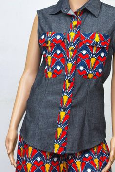 African Print Ankara Sleeveless Denim Top Shirt and Ankara African Print Short set. Denim and Ankara mix, Ankara Short set with Ankara Denim Shirt Top available in US Size 8-14. I can also make this in a Different Print for you and in any Size, so do hit me up. Thank you for choosing Berry Africana. Ankara Short Nicker And Tops, Sleeveless Patchwork Denim Vest For Summer, Sleeveless Cotton Denim Top, Ankara Short Nickers, Summer Sleeveless Denim Vest With Patchwork, Ankara Jeans Tops, Summer Sleeveless Patchwork Denim Vest, Shorts Ankara, Basic Blouse Pattern