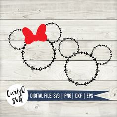 the disney mouse ears are made out of barbed wire and have red bows on them