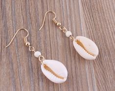 White Cowrie Shell Earrings For The Beach, White Teardrop Beaded Earrings For Beach, Teardrop Beaded Earrings For Beach, Beach Teardrop Beaded Earrings For Pierced Ears, Summer Teardrop Beaded Earrings For Beach, Indie Earrings, Cowrie Shell Jewelry, Shell Jewellery, Ivory Earrings