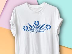 Corningware lover's rejoice! Your favorite vintage kitchen pattern - the famous blue cornflower - is now on a graphic t-shirt, ready to wear. This tee comes in your choice of two colors, and unisex sizes, making it easy to find your fit.  Printed on the soft, light, comfortable Bella + Canvas 3001 t-shirt, with just the right amount of stretch.  FEATURES: *  100% combed and ring-spun cotton *  Fabric weight: 4.2 oz/y² (142 g/m²) *  30 single *  Tear-away label *  Shoulder-to-shoulder taping *  S Blue Floral Print T-shirt With Relaxed Fit, Blue Floral Print Relaxed Fit T-shirt, Blue Floral Print Crew Neck Shirt, Blue Crew Neck Shirt With Floral Print, Blue Floral Print Graphic Tee, Blue Graphic Tee With Floral Print, Blue Floral Print Graphic Tee Shirt, Vintage Love, Vintage Kitchen