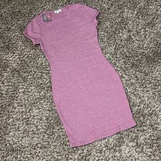 - New With Tags - Size Medium - Ribbed Mini Dress - High Neck - Short Sleeve - Stretch - 60% Cotton 35% Rayon 5% Spandex - Top To Bottom: 33 Inches Side To Side: 15 Inches Purple Fitted Short Sleeve Bodycon Dress, Purple Fitted Bodycon Dress With Short Sleeves, Purple Short Sleeve Bodycon Summer Dress, Purple Short Sleeve Bodycon Dress For Summer, Casual Pink Stretch Bodycon Dress, Casual Pink Fitted Bodycon Dress, Fitted Purple Midi Dress Casual Style, Purple Fitted Casual Midi Dress, Casual Fitted Purple Midi Dress