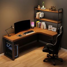 a computer desk with a monitor, keyboard and mouse on it in front of a bookshelf